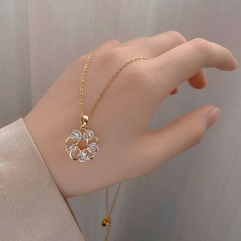 Gilded Whispers Pendant Necklace