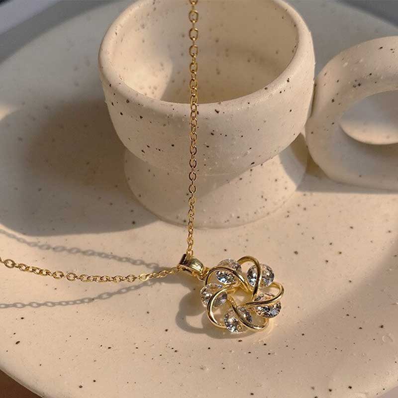 Gilded Whispers Pendant Necklace